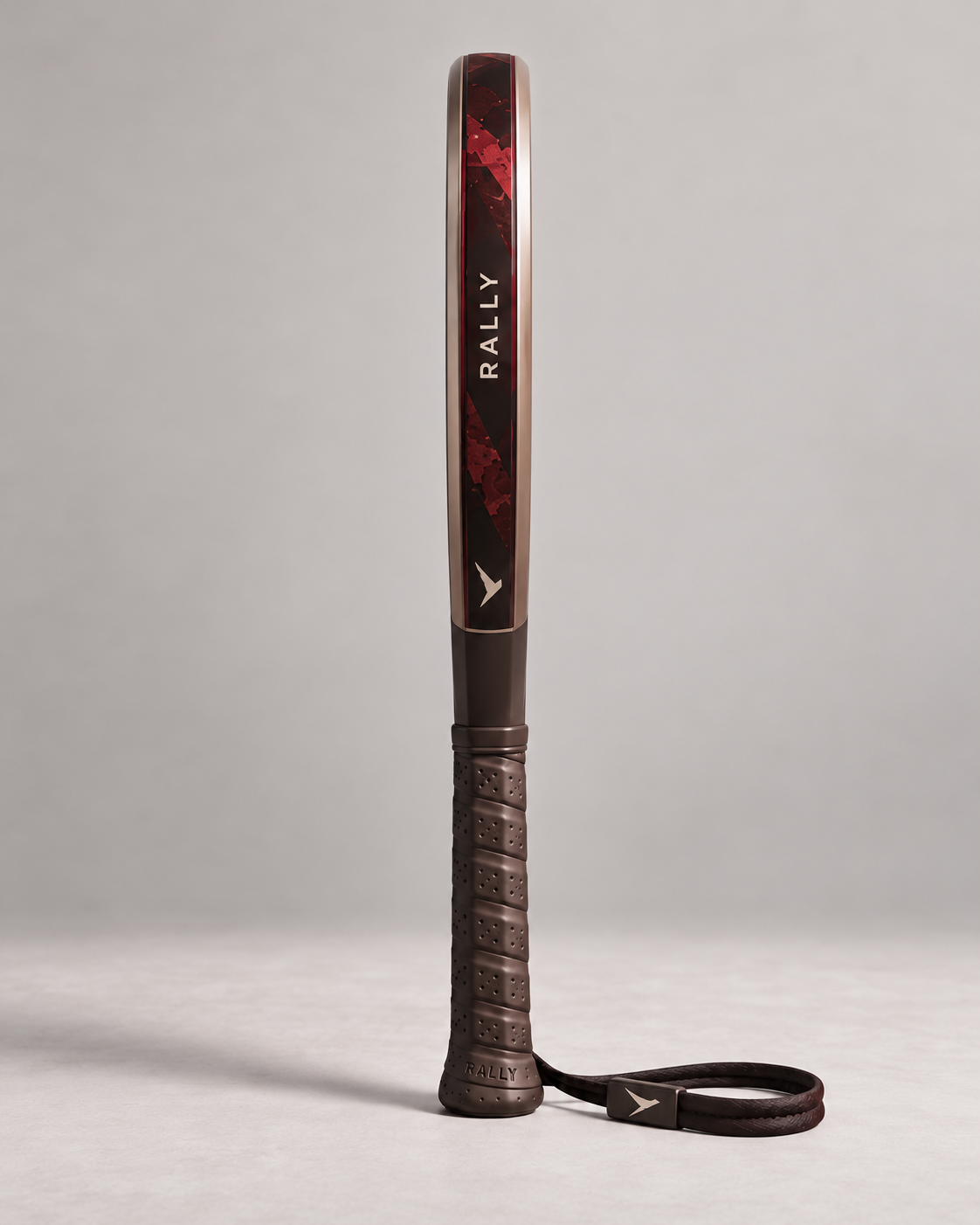 Side profile of a RALLY carbon padel racket showing its frame construction